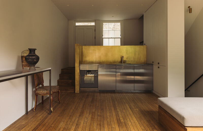 Open plan living area connected to Arclinea kitchen and private garden terrace