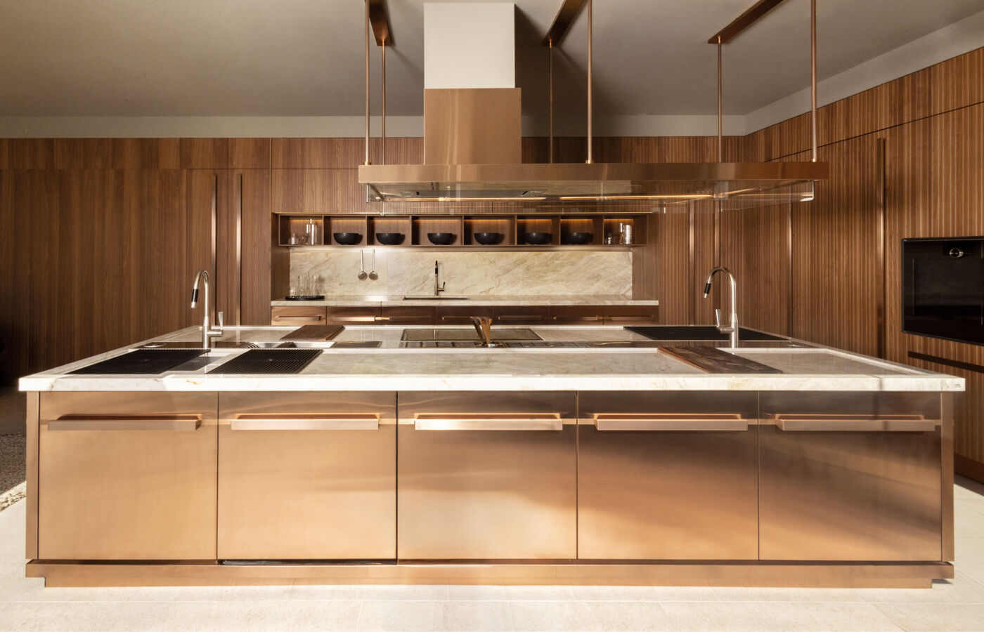Arclinea Proxima kitchen in bronze pvd finish with marble island and wood cabinetry