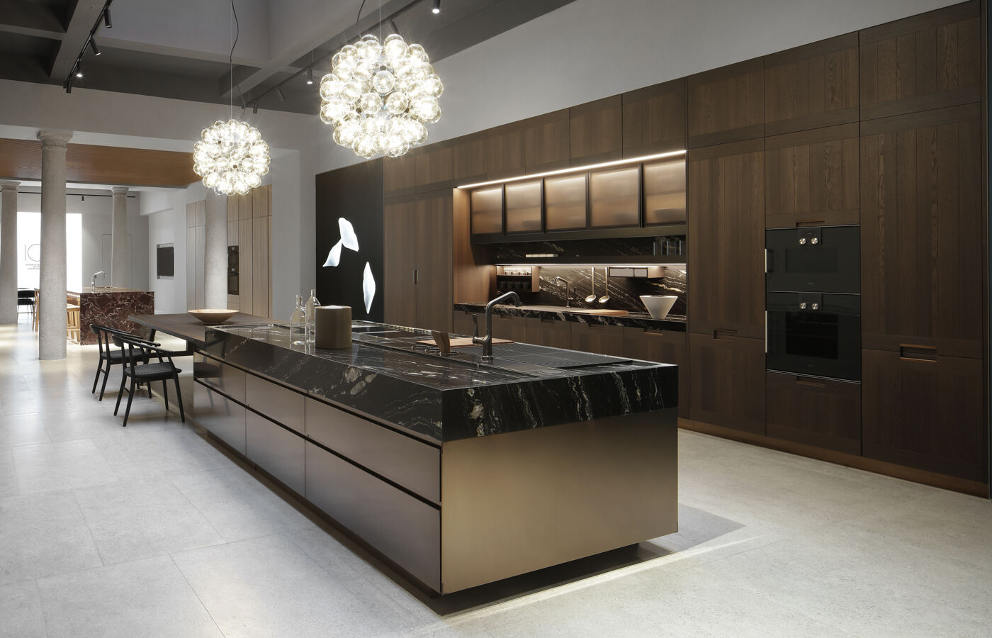 Convivium Arclinea kitchen with black marble worktop presented for 2025 Milan Design Week