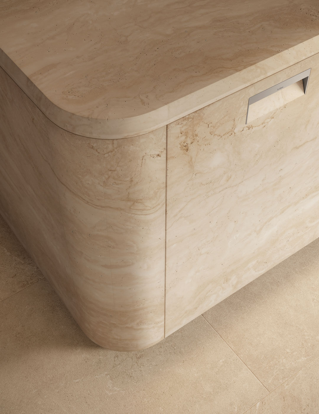 Arclinea kitchen island detail in travertine with rounded edge, integrated handle and seamless stone cladding