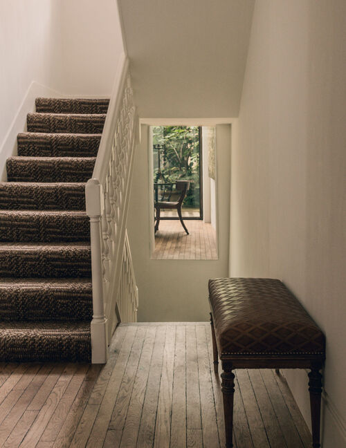 Stair hall leading to Arclinea kitchen and garden extension with oak flooring