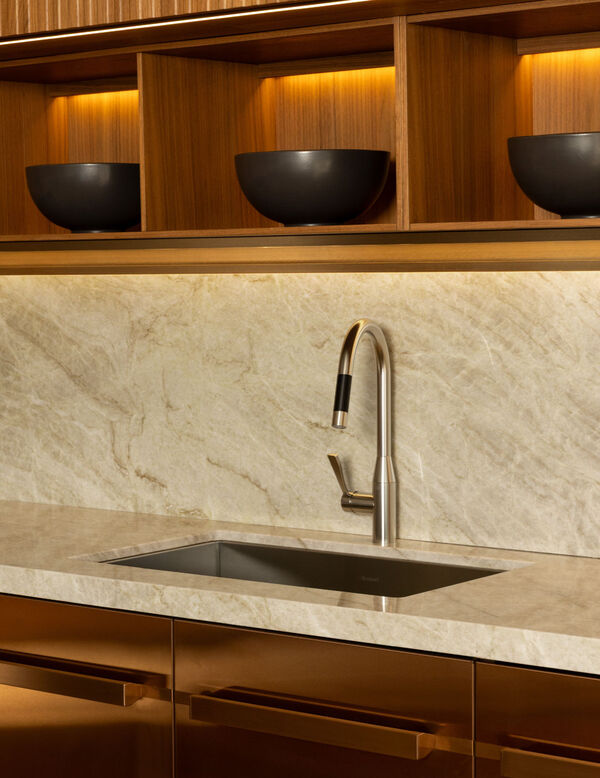 Arclinea Proxima kitchen marble sink and stainless steel tap detail