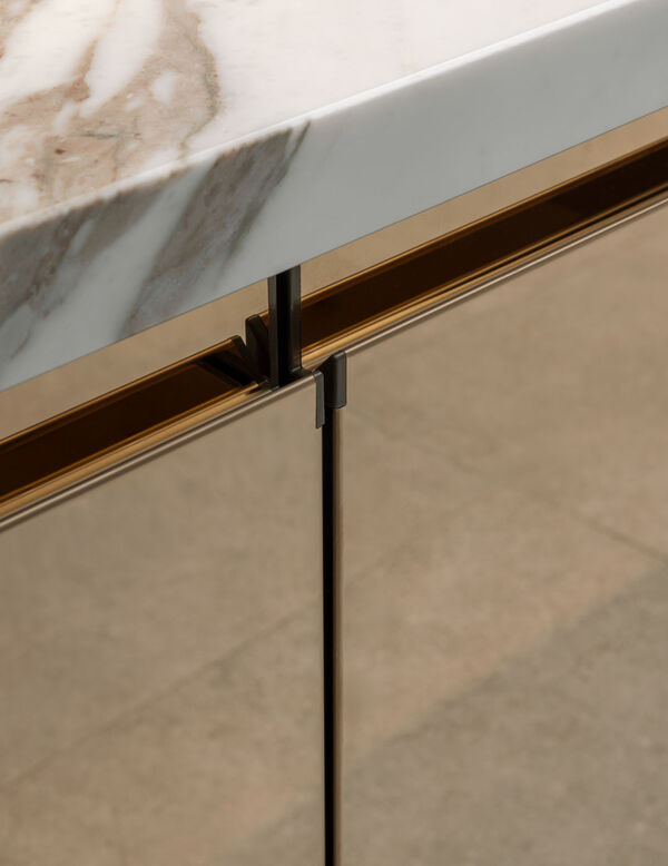 brass stainless steal handle and marble top Arclinea kitchen