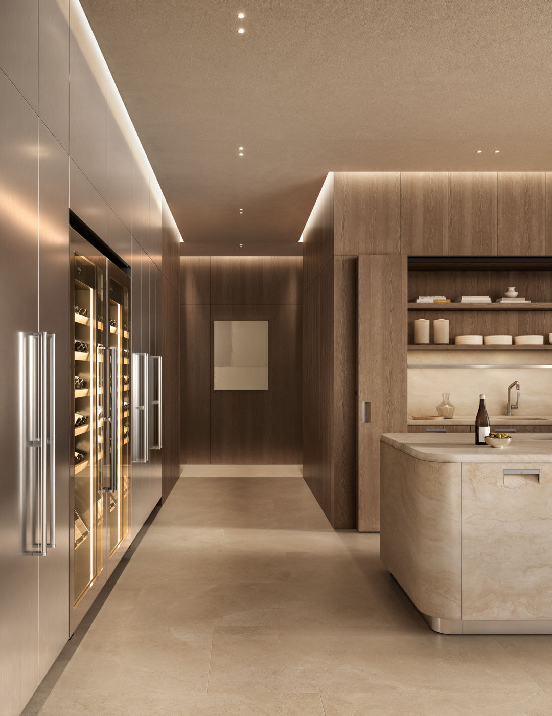 kora kitchen with travertine island and integrated handle, stainless steel wine storage units and oak cabinetry with recessed workspace